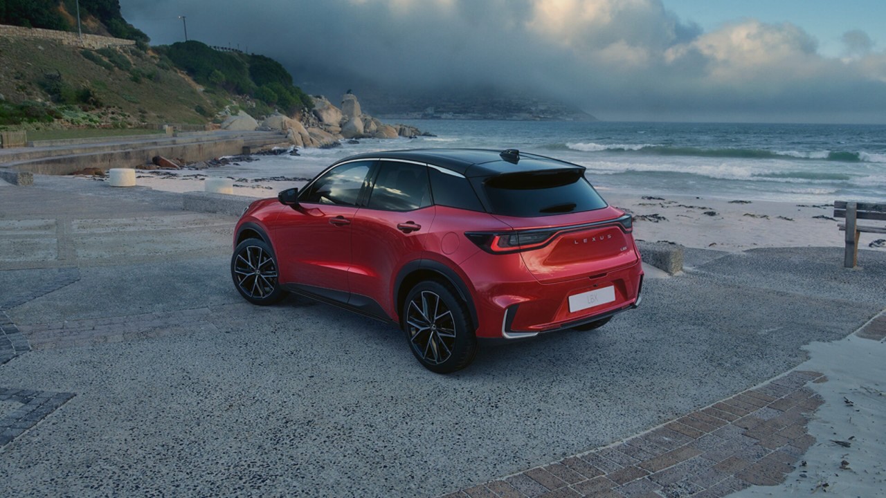 Lexus LBX parked on a beachfront